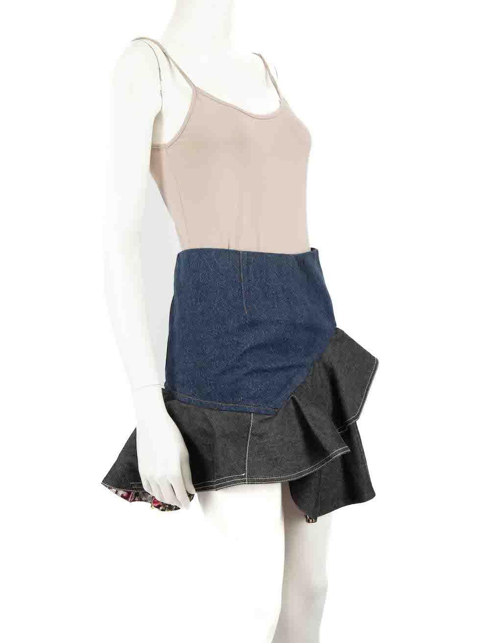 CONDITION is Very good. Hardly any visible wear to skirt is evident on this used Alexander McQueen designer resale item.
 
 Details
 Two tone- blue and black
 Denim
 Skirt
 Mini
 Ruffle hem
 Back zip and hook fastening
 
 
 Made in Italy
 
