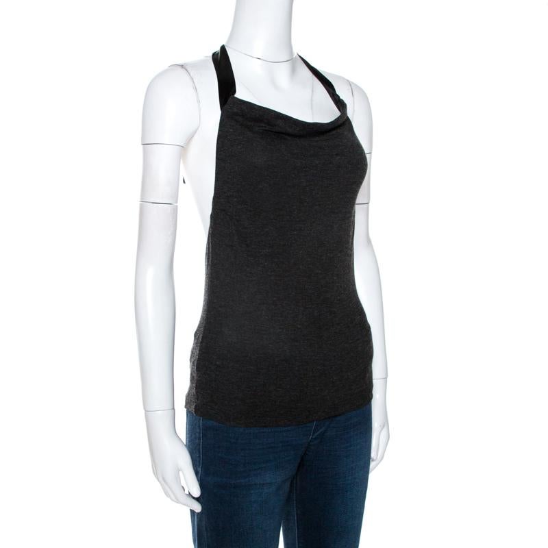 Another treasure from the house of Alexander McQueen, this top is a buy you will love. This grey top exhibits a standout design and serves well for special occasions. It is tailored into a halter-neck style with self-tie at the back.

