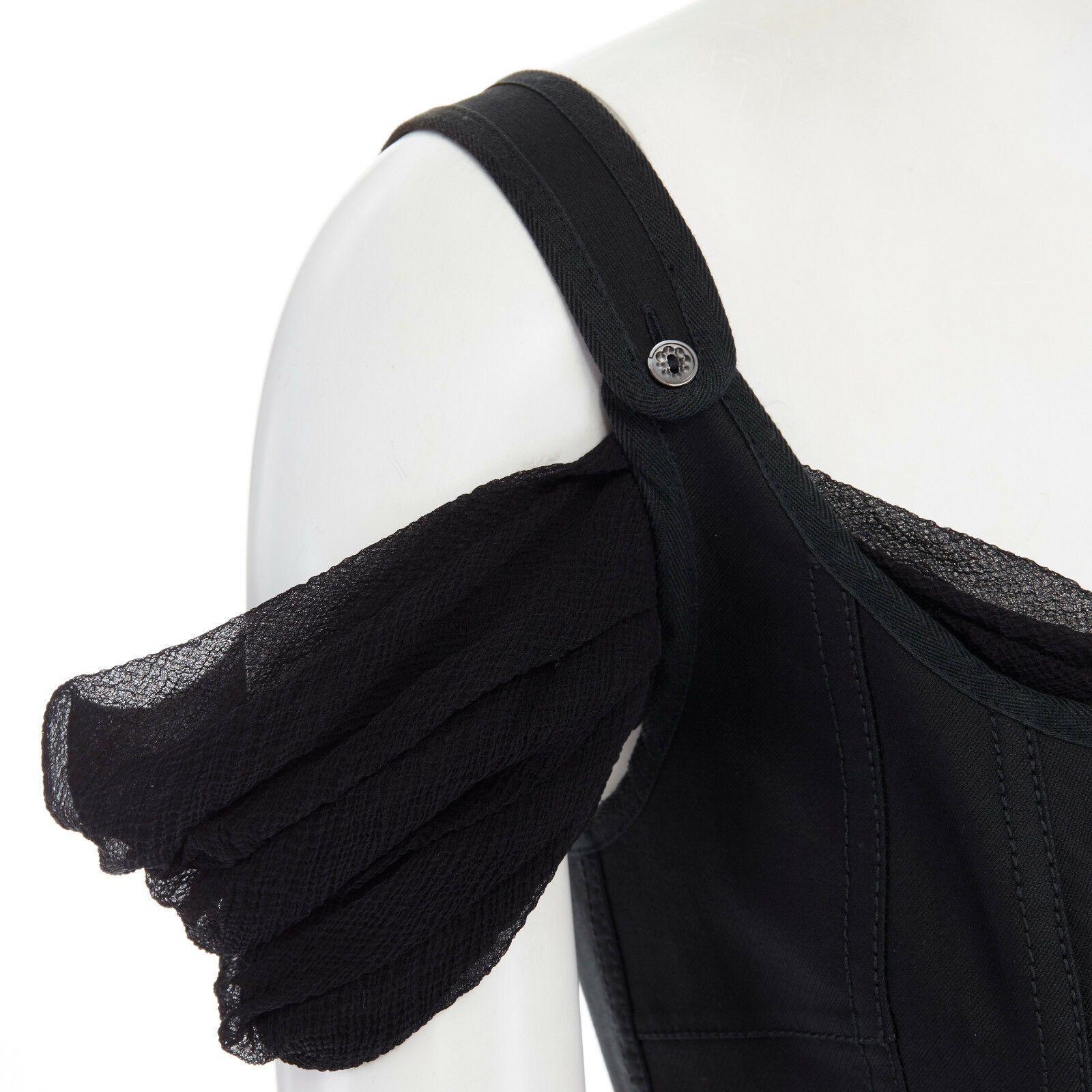 ALEXANDER MCQUEEN Vintage SS05 black drape silk bustier sheer top IT40 US2 UK8 S

ALEXANDER MCQUEEN
FROM THE SPRING  SUMMER 2005 BLACK COTTON BUSTIER LAYERE OVER SHEER SILK TOP . DRAPED SHEER SILK . PLEATING ALONG SIDE SEAMS . COLD SHOULDER . DRAPED