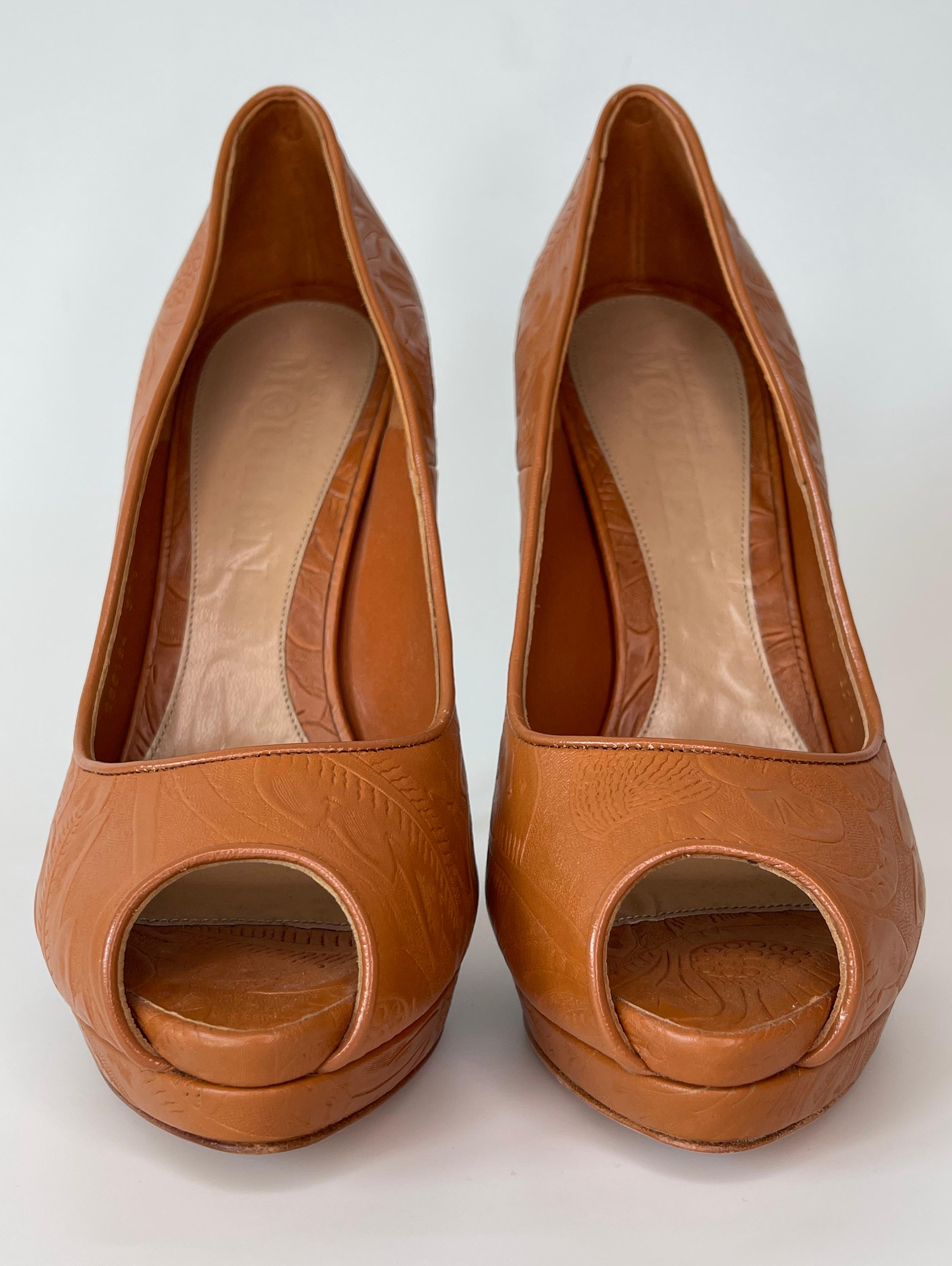 COLOR: Brandy (mixture of orange and brown)
MATERIAL: Leather with wood heel
ITEM CODE: 266184
SIZE: 37.5 EU / 6.5 US
HEEL HEIGHT: 147 mm (5.8 in)
COMES WITH: Original box 
CONDITION: Excellent - strong shoes with minimal sings of wear consistent