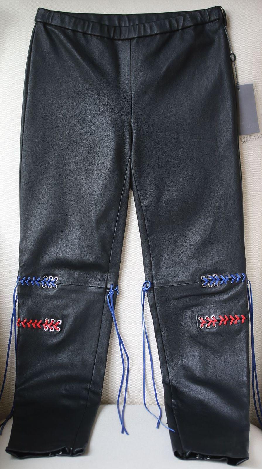 These leggings are cut from stretchy black leather and have red and blue whipstitch lacing - a nod to the region's 'Cloutie' trees which are strung with strips of cloth to represent hopes, dreams and wishes. Black, blue and red stretch-leather.