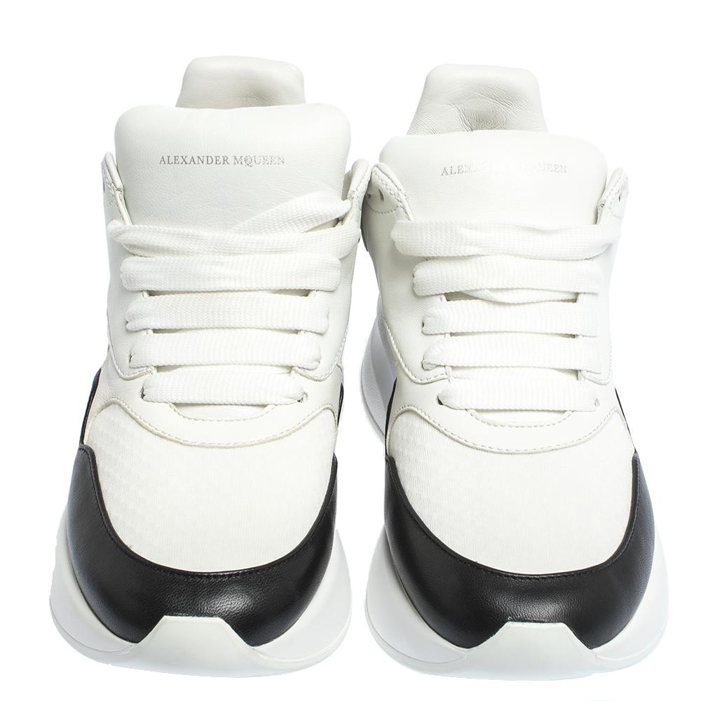 These sneakers from Alexander McQueen are truly a maker of trends. The pair in white and black is designed in a low-top profile using leather and mesh. Finished with lace-ups and high soles, this pair is filled with comfort and style, just perfect