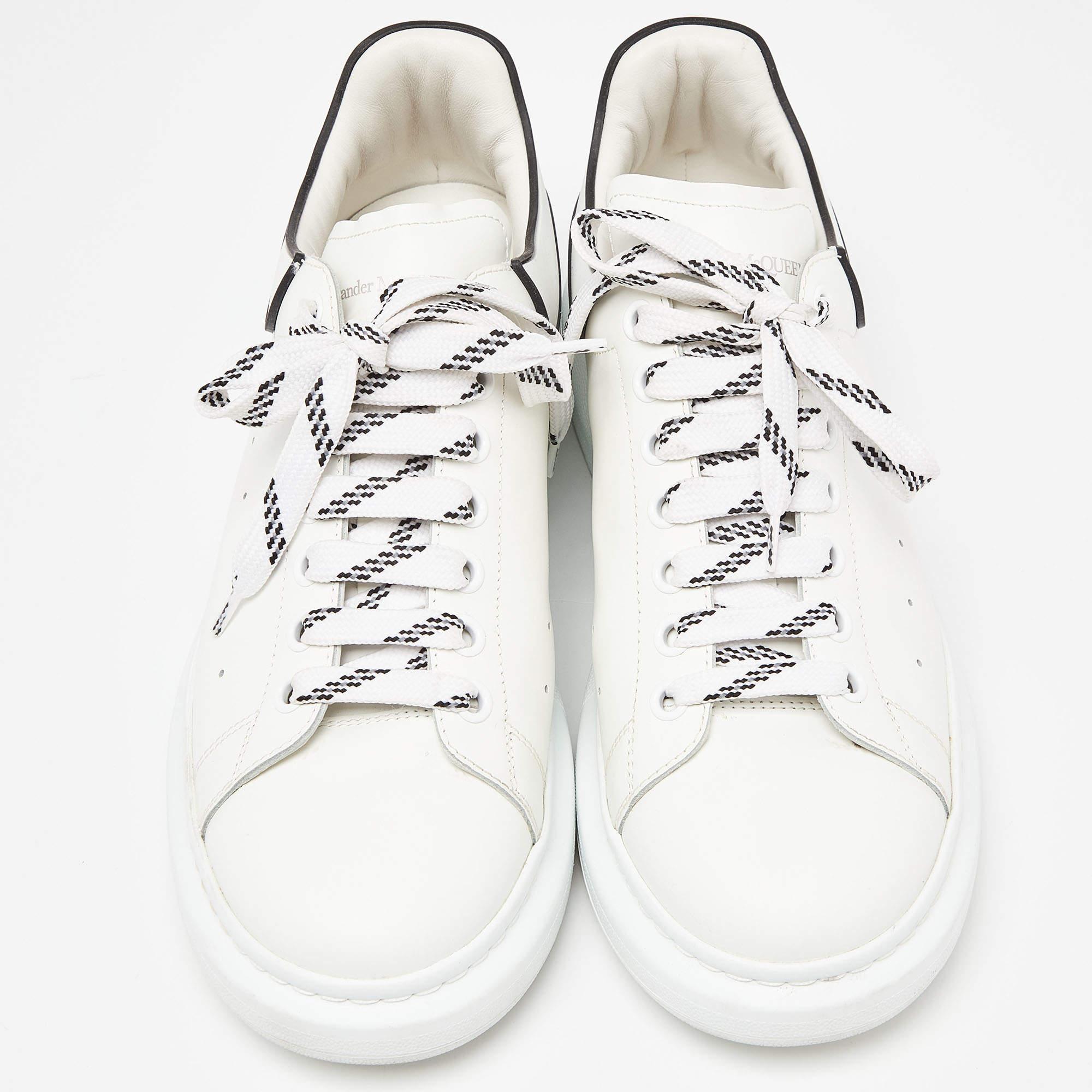 Coming in a classic silhouette, these Alexander McQueen sneakers are a seamless combination of luxury, comfort, and style. These sneakers are designed with signature details and comfortable insoles.

Includes: Original Box, Info Booklet

