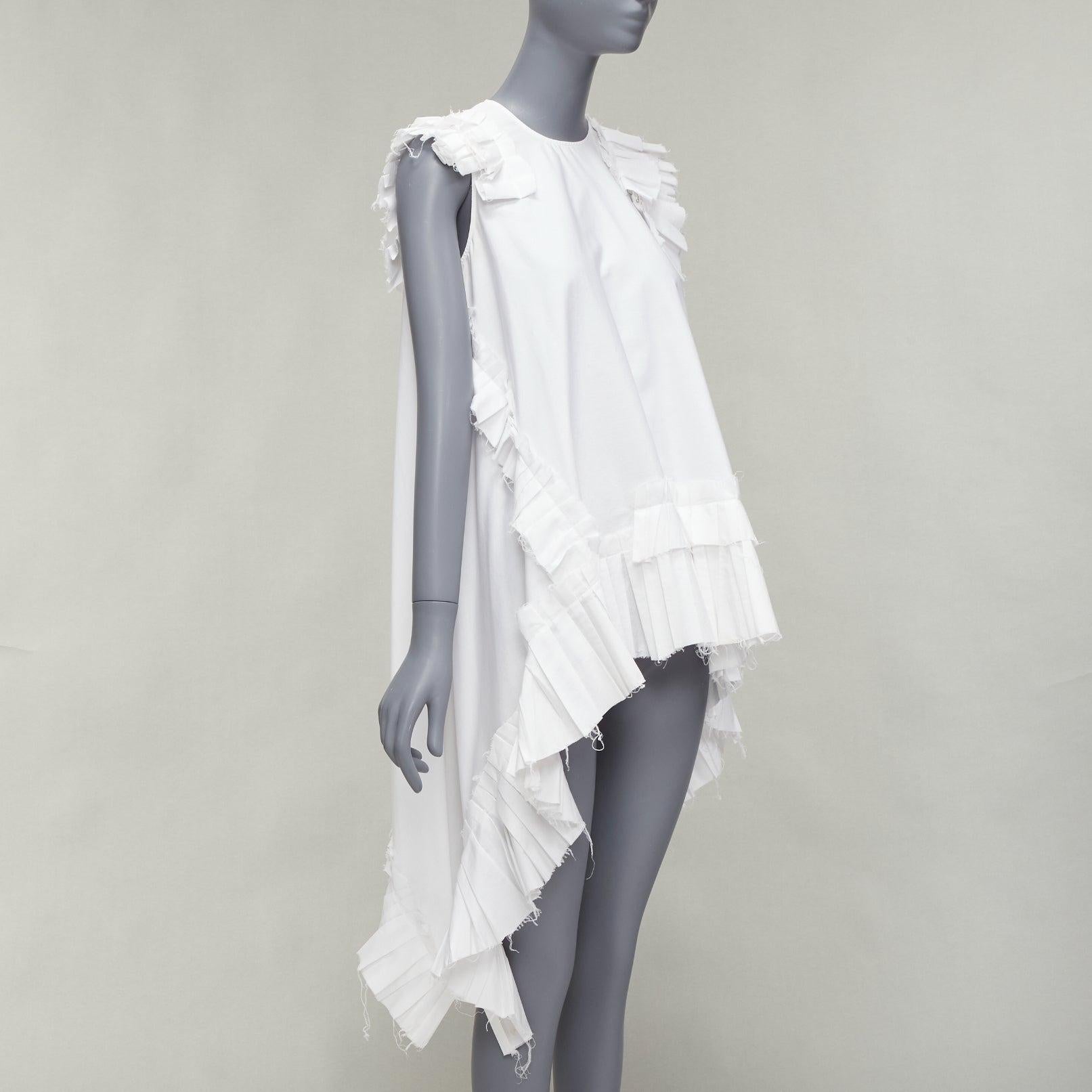 ALEXANDER MCQUEEN white cotton asymmetric ruffle high low hem tunic top IT38 XS
Reference: NKLL/A00227
Brand: Alexander McQueen
Designer: Sarah Burton
Material: Cotton
Color: White
Pattern: Solid
Closure: Keyhole Button
Made in:
