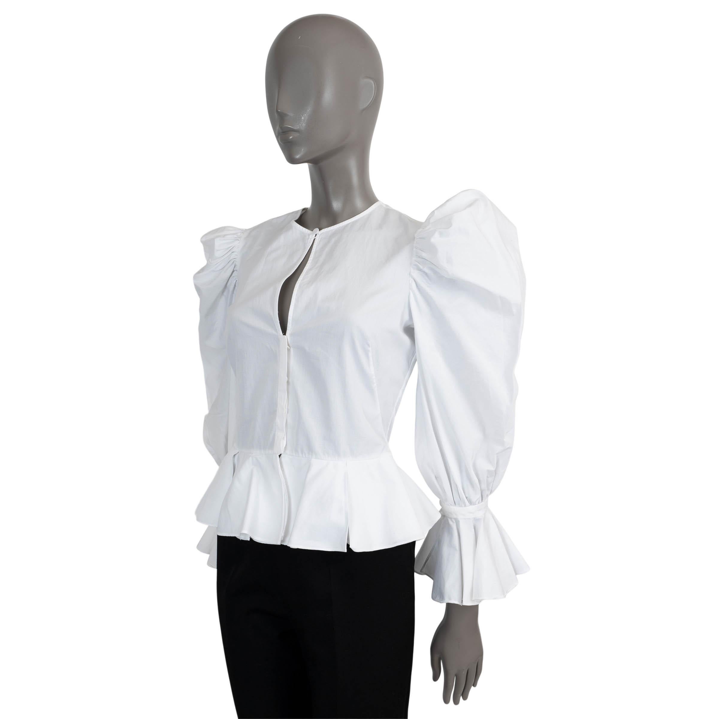 100% authentic Alexander McQueen peplum balloon sleeve blouse in white cotton (100%). Features round-neck with ruffles at the hem and cuffs. Closes with buttons on the front. Has been worn and is in excellent condition.

Measurements
Tag