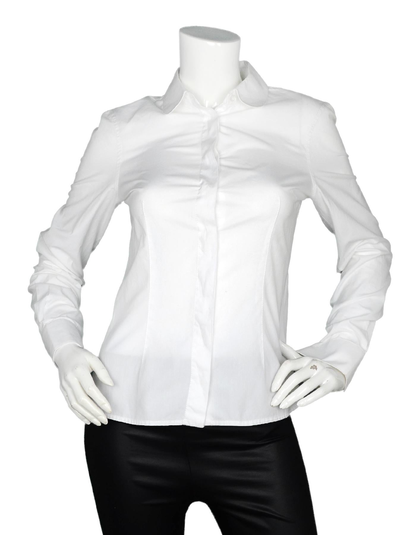Alexander McQueen White Cotton Button Down Longsleeve Blouse Sz 40

Made In: Italy
Color: White
Materials: 100% cotton
Opening/Closure: Button down
Overall Condition: Excellent pre-owned condition with exception of small stain on sleeve (see