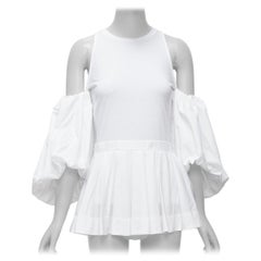 ALEXANDER MCQUEEN camiseta peplum de algodón blanco con hombros fríos y mangas abullonadas IT38 XS