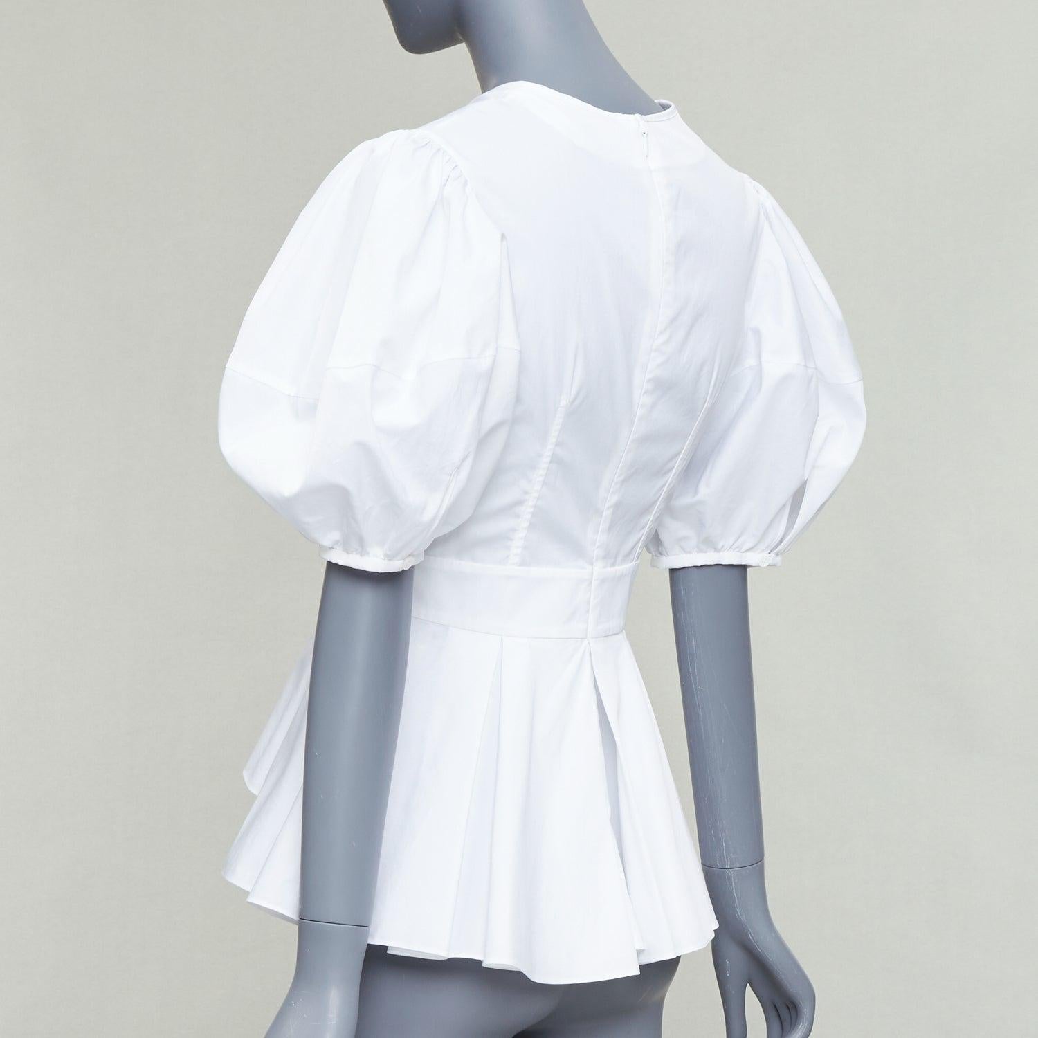 ALEXANDER MCQUEEN top peplum de algodón blanco con mangas abullonadas y pliegues delanteros IT38 XS en venta 1