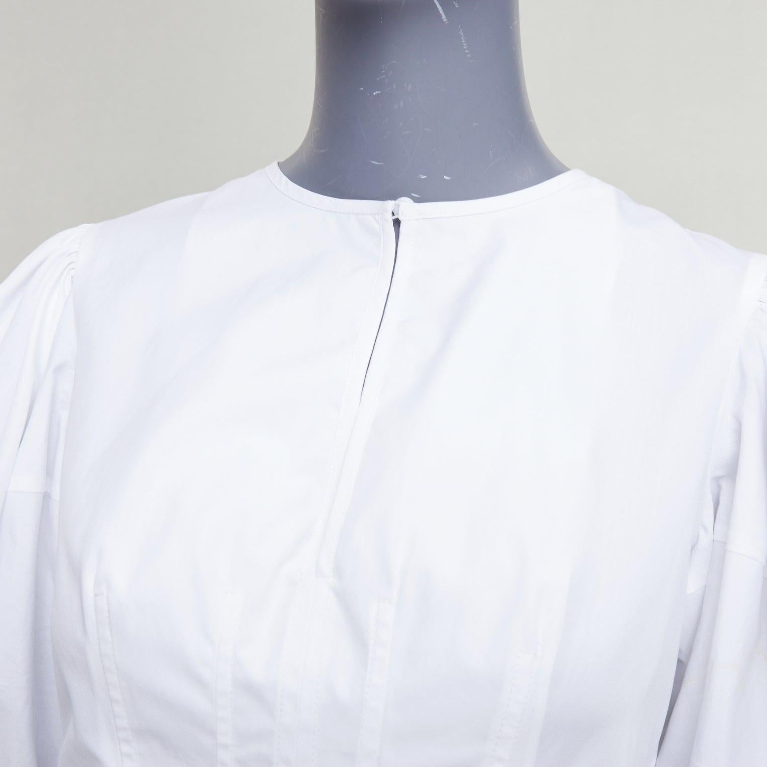 ALEXANDER MCQUEEN top peplum de algodón blanco con mangas abullonadas y pliegues delanteros IT38 XS en venta 2