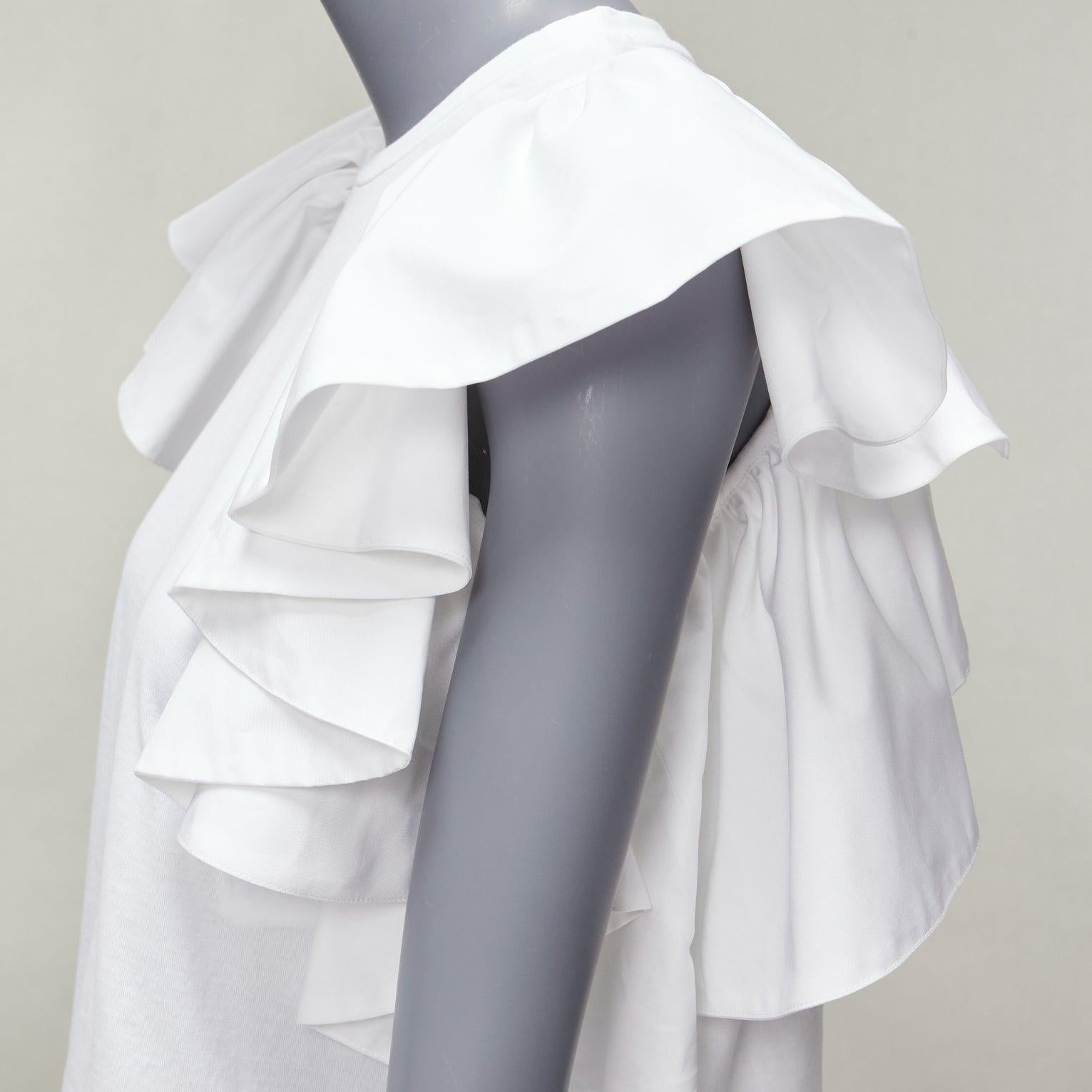 ALEXANDER MCQUEEN white cotton ruffle sleeve crew neck crop top IT38 XS
Reference: AAWC/A00795
Brand: Alexander McQueen
Designer: Maria Grazia Chiuri
Material: Cotton
Color: White
Pattern: Solid
Closure: Pullover
Made in: