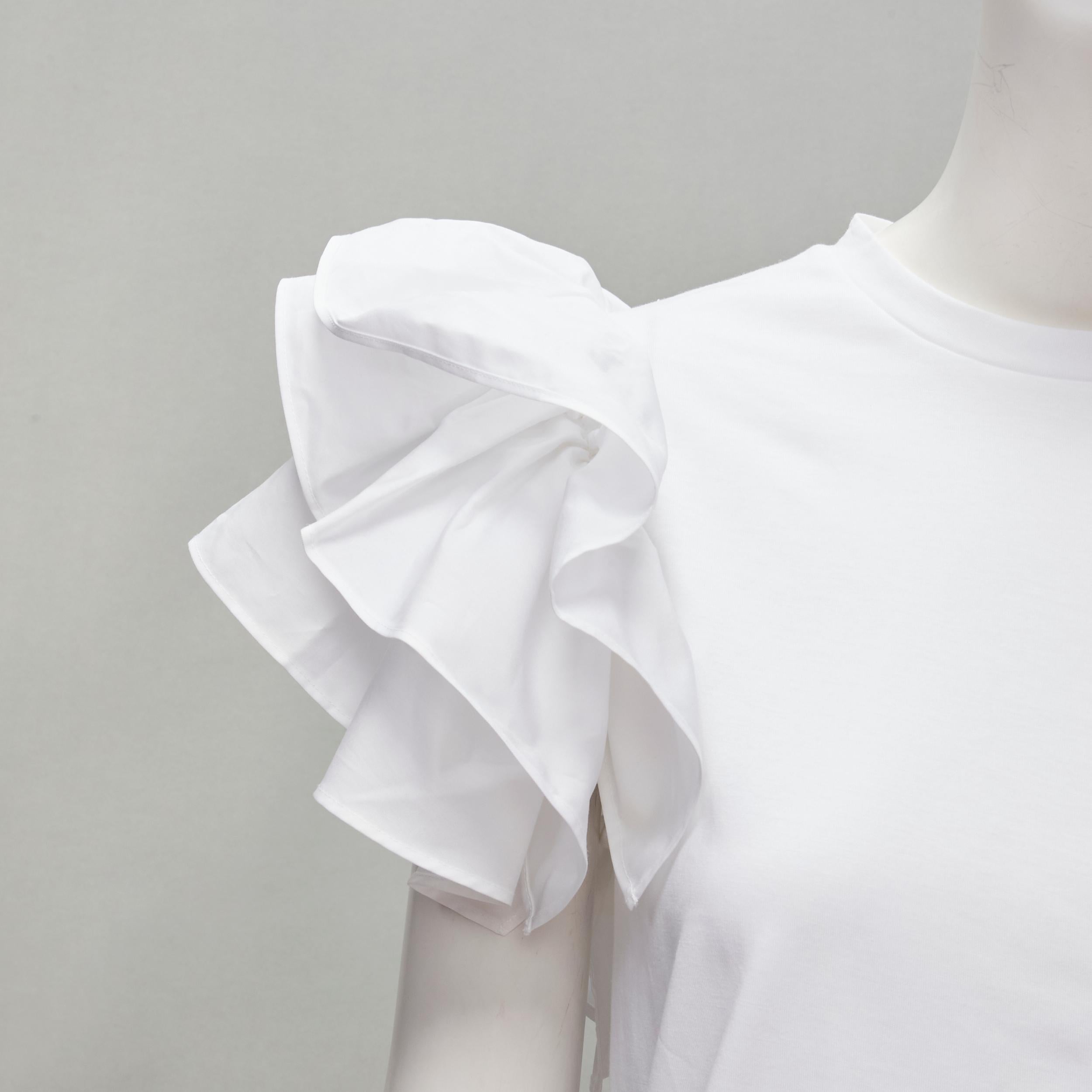 ALEXANDER MCQUEEN white cotton ruffle sleeve crew neck tshirt XS IT38
Reference: AAWC/A00209
Brand: Alexander McQueen
Designer: Sarah Burton
Material: Cotton
Color: White
Pattern: Solid
Closure: Pullover
Made in: Italy

CONDITION:
Condition: