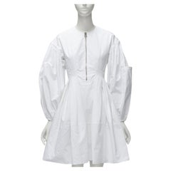 ALEXANDER MCQUEEN vestido acampanado de algodón blanco con cremallera plateada y manga abullonada IT36 XS
