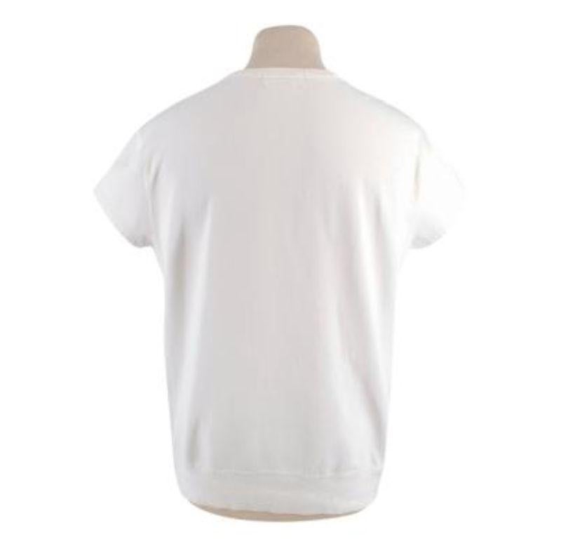 Alexander McQueen White Cotton Top

-Ribbed collar & hem 
-Short sleeve 
-Slight stretch body 
-Relaxed fit 
-Round neckline 

Material: 

57% Polyamide 
43% Cotton

9.5/10 excellent conditions, please refer to images for further details. 

PLEASE