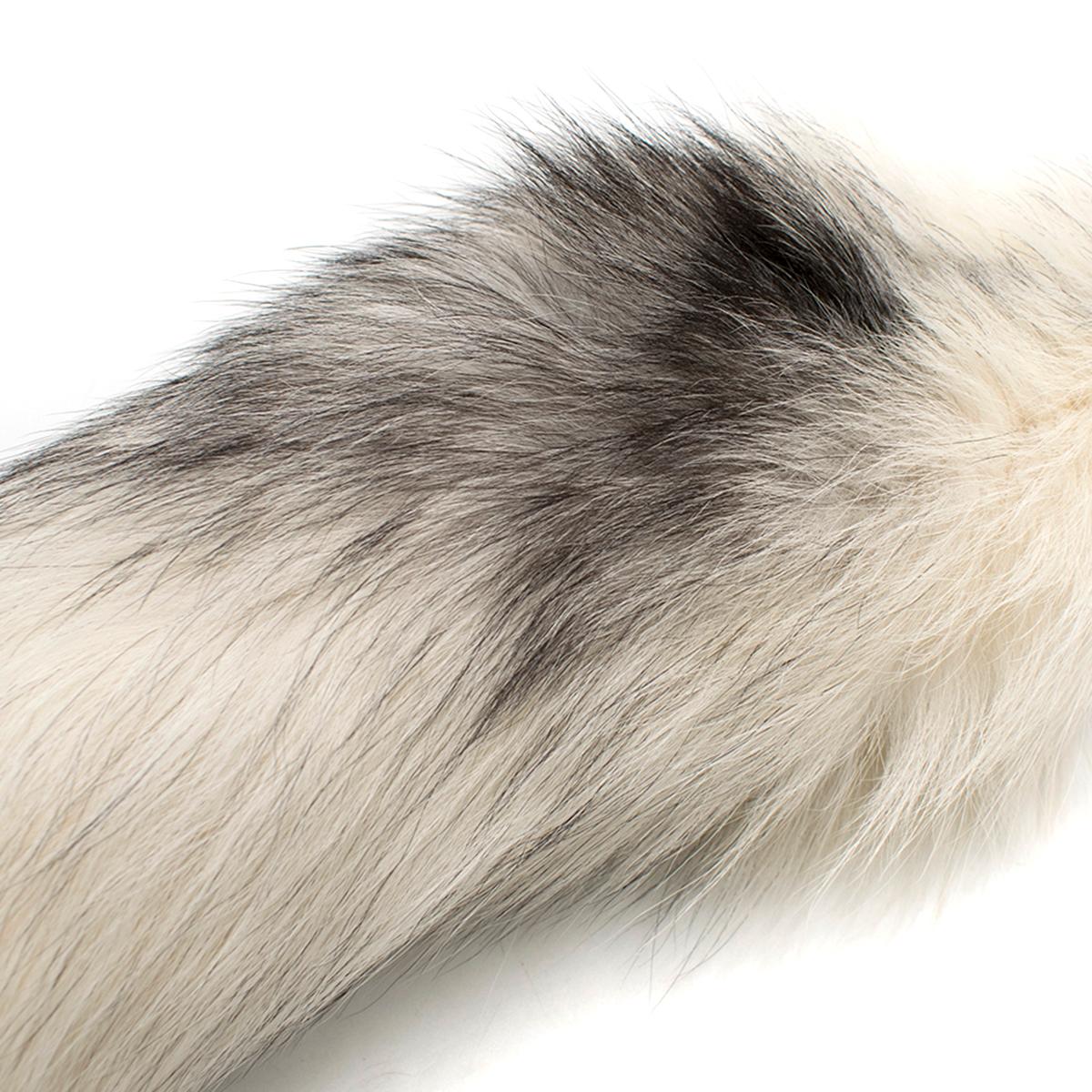 Alexander McQueen White Fox Fur Tail Charm

- 100% Fox Fur Charm
- Natural size from Finland 
- Silver toned hook attachment 
- Can be hung on necklaces, trousers, bags, keychains etc 

Please note, these items are pre-owned and may show some signs