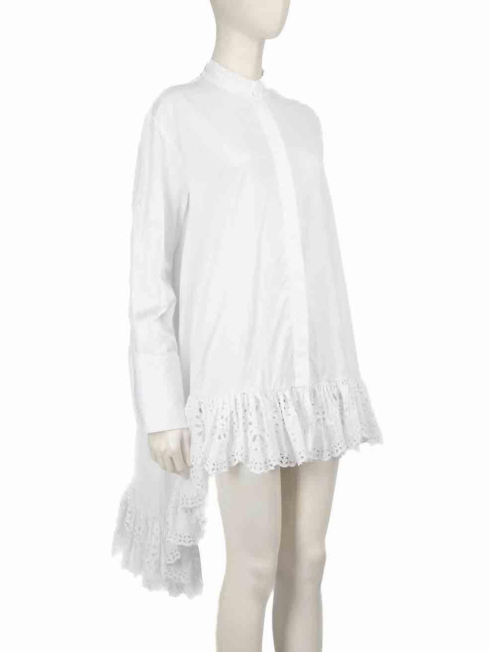 CONDITION is Very good. Hardly any visible wear to dress is evident on this used Alexander McQueen designer resale item.
 
 
 
 Details
 
 
 White
 
 Cotton
 
 Shirt dress
 
 Mini
 
 Lace trimmed
 
 High low hem
 
 Long sleeves
 
 Buttoned cuffs
 
