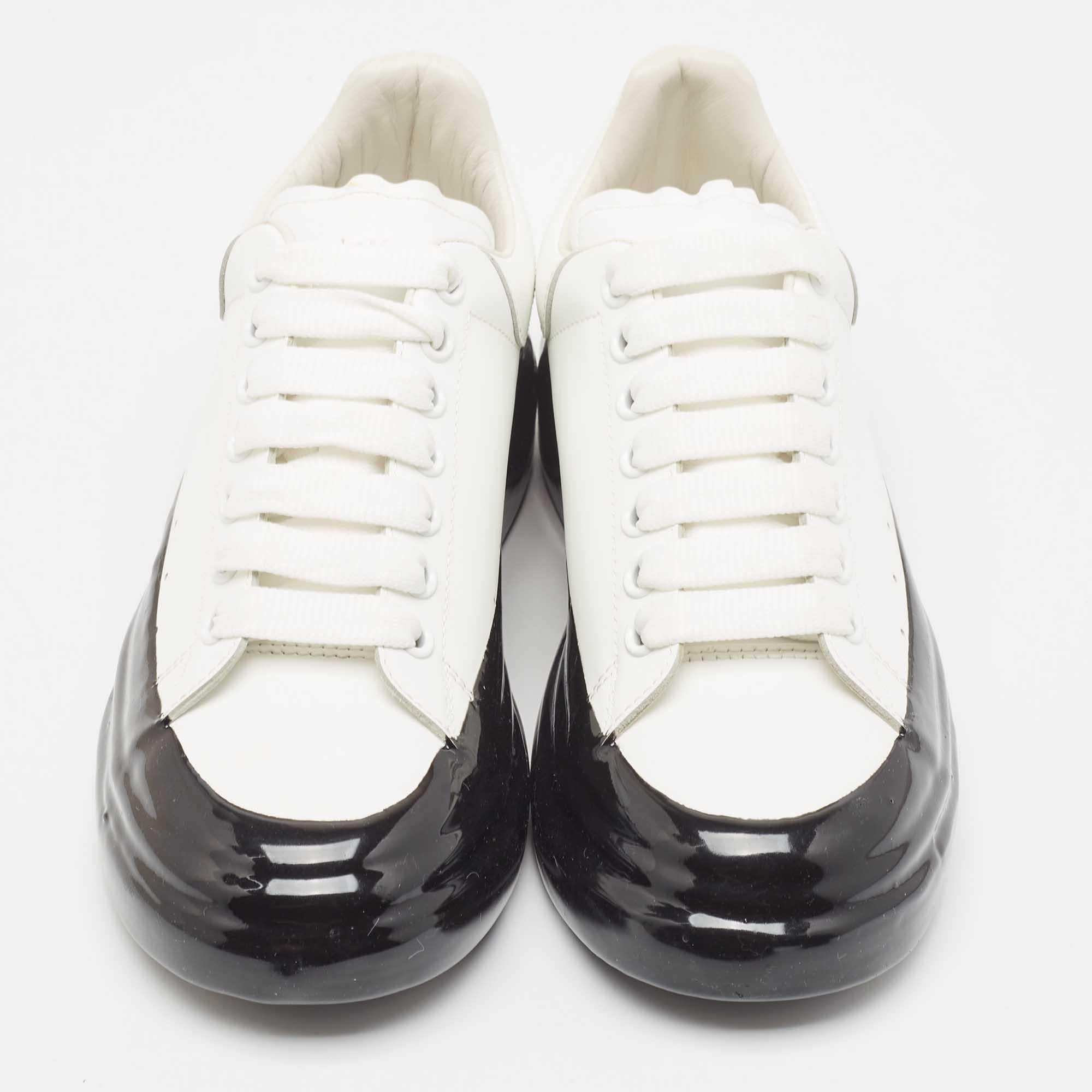 Give your outfit a luxe update with this pair of Alexander McQueen sneakers. The shoes are sewn perfectly to help you make a statement in them for a long time.

Includes
Original Box, Info Booklet
