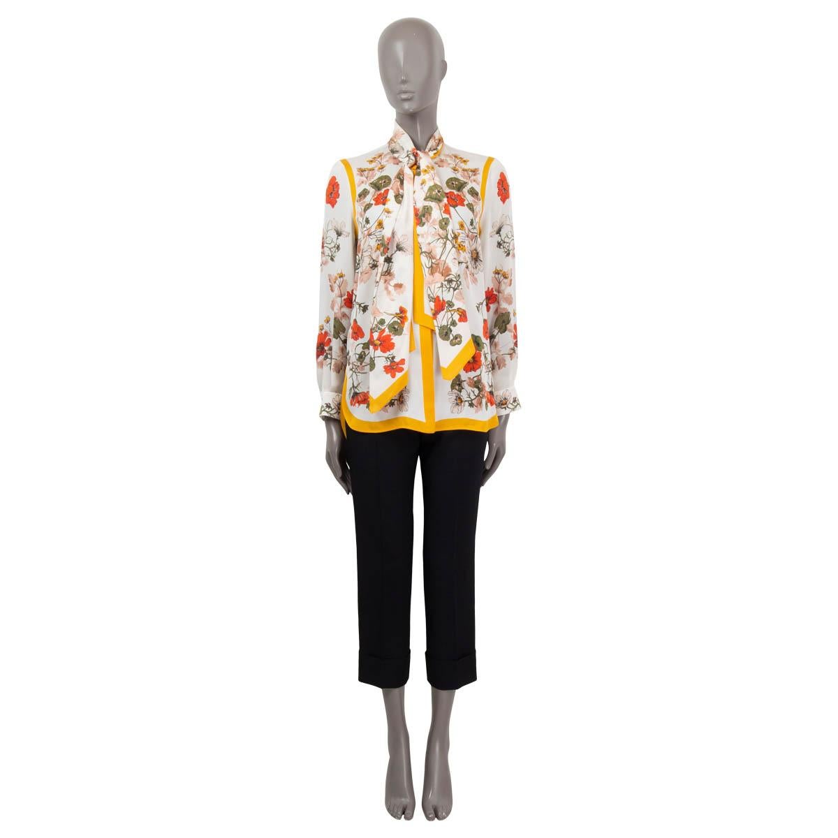 100% authentic Alexander McQueen blouse in off-white crepe de chine silk (100%) with floral-print in olive, yellow and orange. Hidden buttons and pussy-bow around the neck. Has been worn and is in excellent condition. 

Measurements
Tag