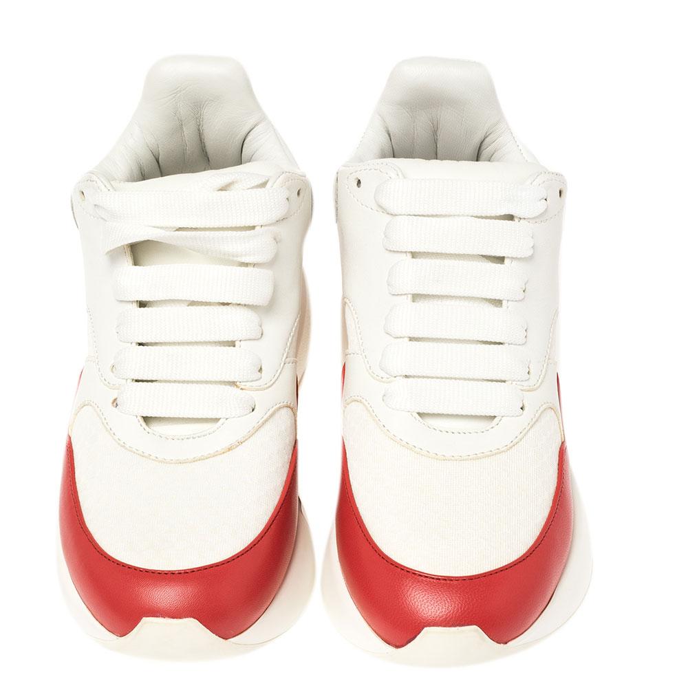 These sneakers from Alexander McQueen are truly a maker of trends. The oversized sneakers are designed in a low-top profile using white/red leather and fabric. Finished with lace-ups and high soles, this pair is filled with comfort and style, just