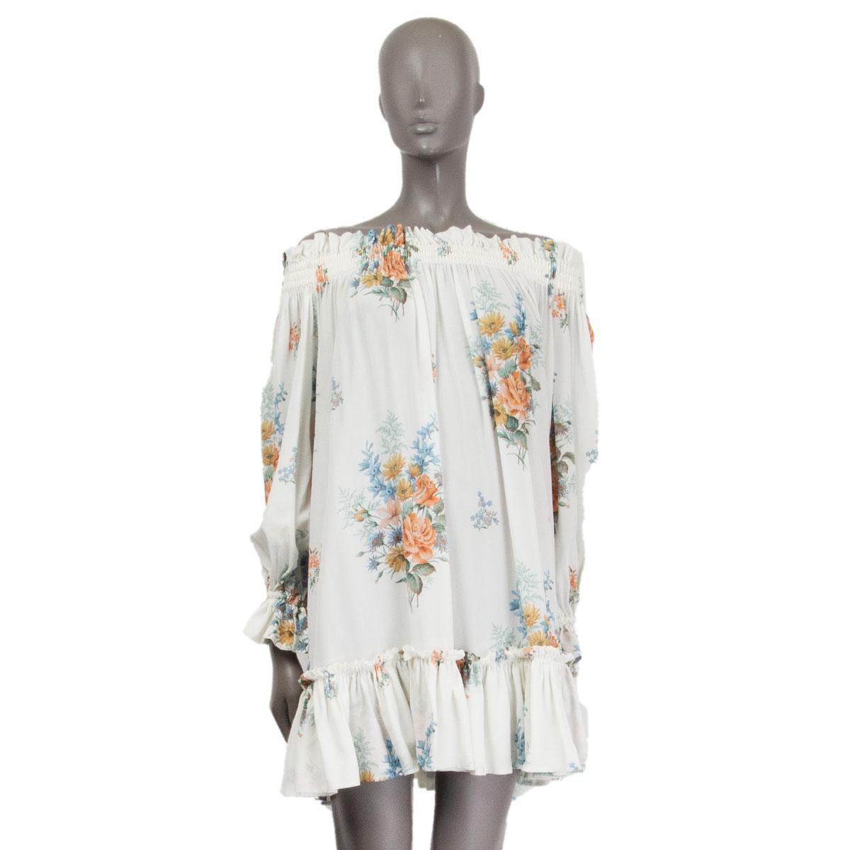 authentic Alexander McQueen carmen-neckline babydoll dress in off-white, yellow, orange, green and light blue floral printed silk (100%) missing tag. Ruched neckline, cuffs and hem-line. Has been worn with two faint yellow stains on the inner side