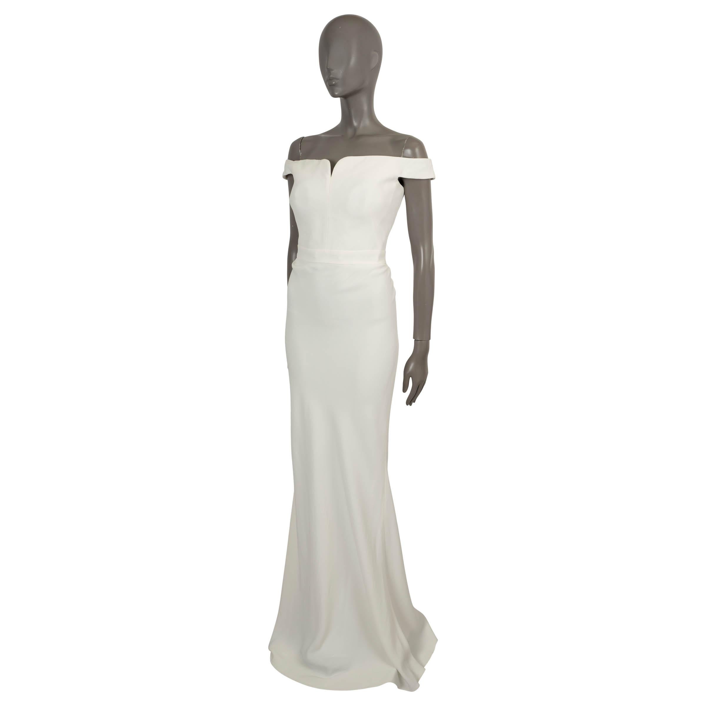 100% autentico abito Alexander McQueen in crepe di viscosa bianca (52%) e acetato (48%). Presenta una silhouette a colonna con orlo a terra, scollatura a cuore, spalline e bustier imbottito. Si chiude con una cerniera nascosta sul retro ed è