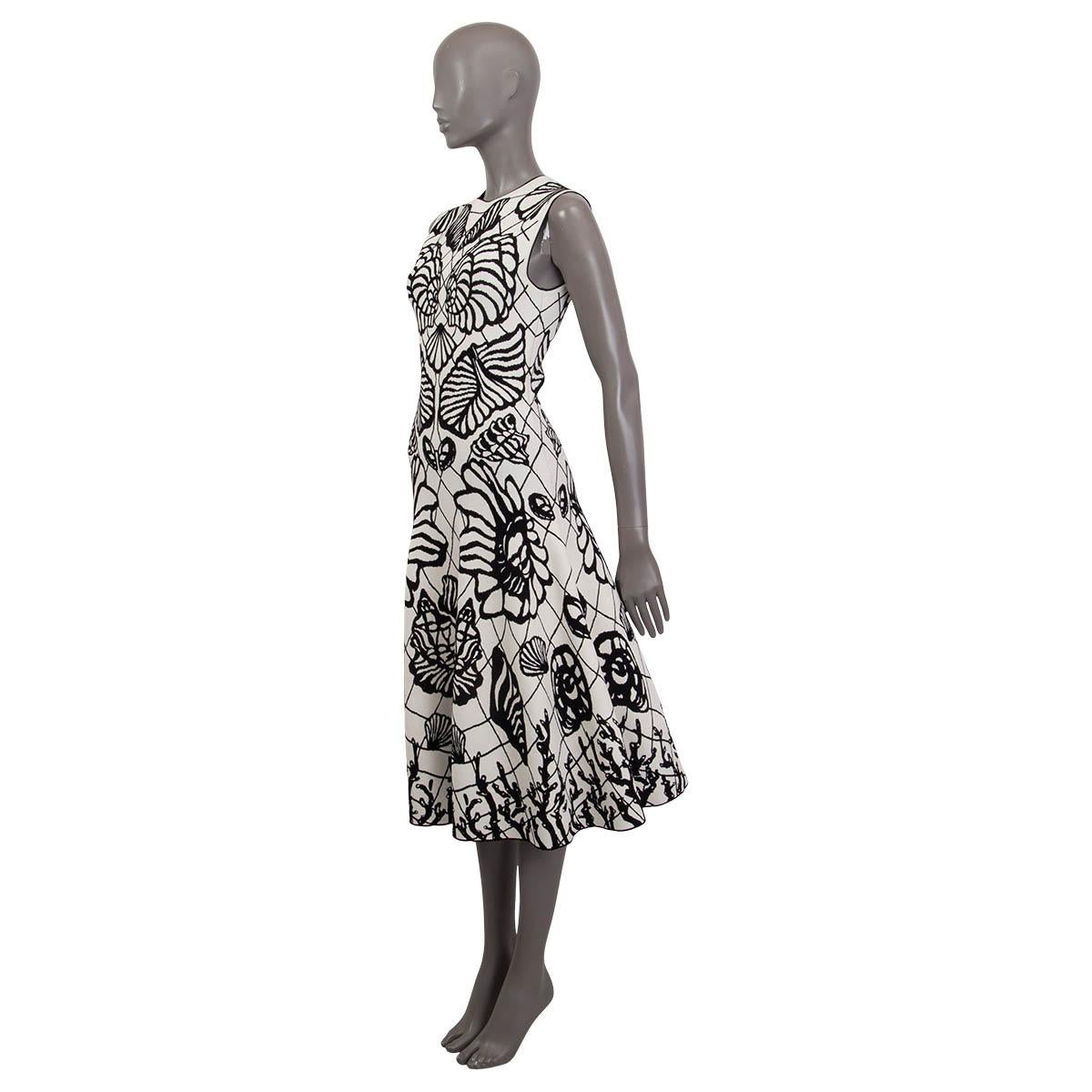 100% authentic Alexander McQueen monochrome shell-print midi skater dress black and white viscose (81%), polyamide (2%) and elastane (1%) (please note the content tag is missing). Features a crew neckline and a flared skirt. Embellished with an