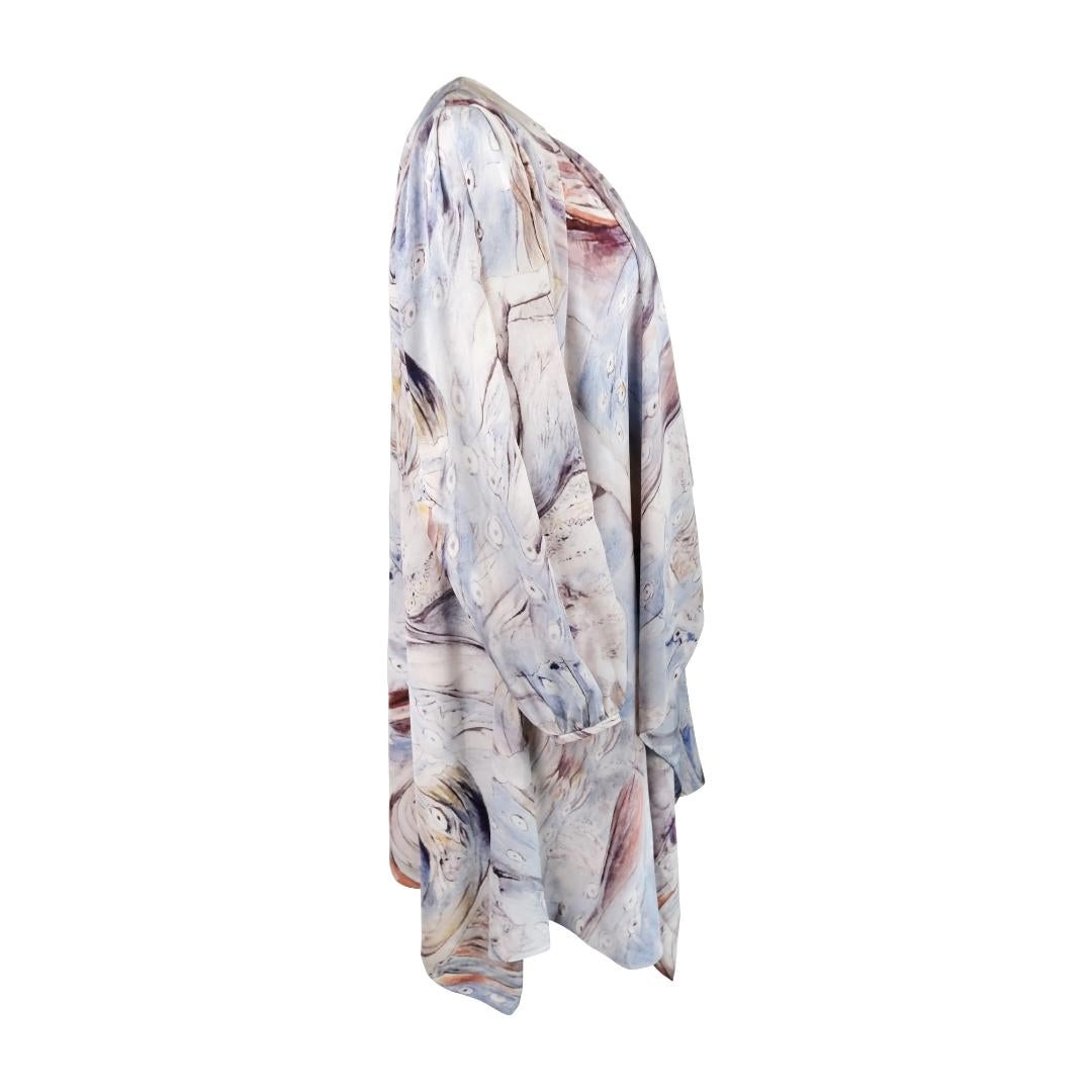 This ethereal Alexander McQueen silk dress features a stunning 