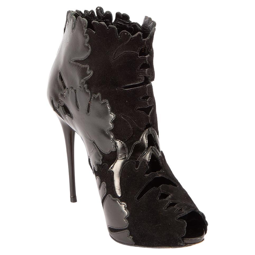 Alexander McQueen Women's Black Abstract Cut Out Heeled Boots For Sale