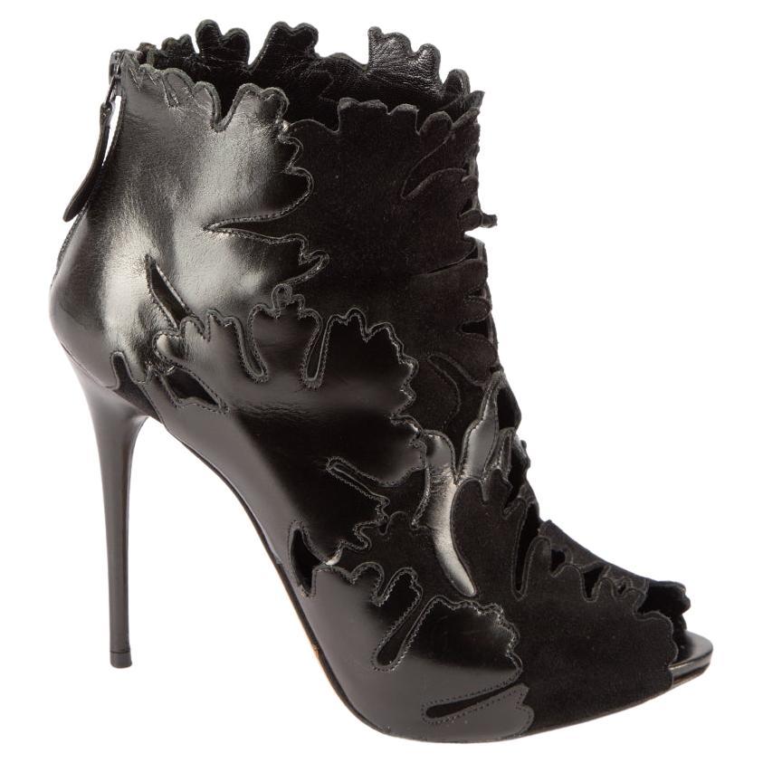 Alexander McQueen Women's Black Abstract Cut Out Heeled Boots For Sale