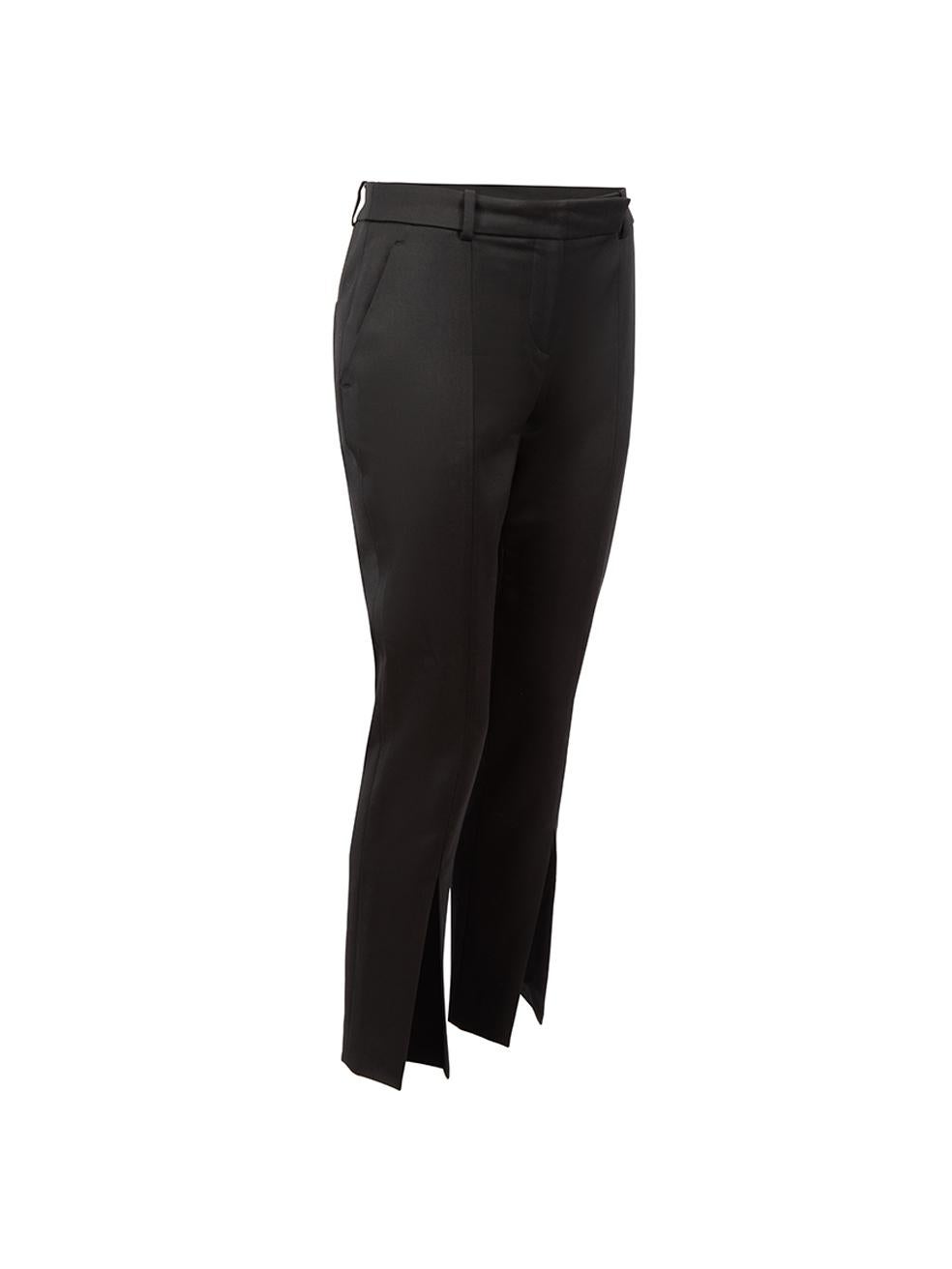 CONDITION is Very good. Hardly any visible wear to trousers is evident other than some loose stitching to the right leg hem slit on this used Alexander McQueen designer resale item. 
 
 Details
  Black
 Wool
 Slim fit trousers
 Low rise
 Slit on leg