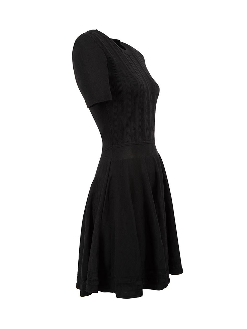 CONDITION is Very good. Hardly any visible wear to dress is evident on this used McQ designer resale item.



Details


Black

Viscose

Mini knit dress

Stretchy

Round neckline

Short sleeves





Made in China



Composition

85% Viscose and 15%
