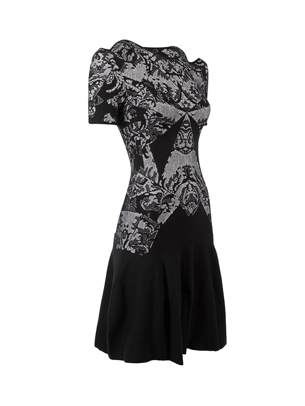 CONDITION is Very good. Hardly any visible wear to dress is evident on this used McQ Alexander McQueen designer resale item.



Details


Black

Viscose

Knit mini dress

Damask pattern

Round neckline

Shoulder cut out accent

Stretchy





Made in