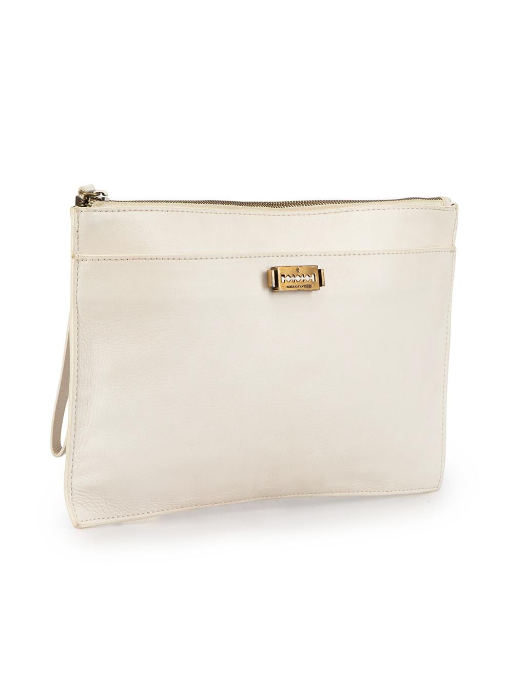 CONDITION is Good. Minor wear to clutch is evident. Light wear to the front and back with scratches and marks to the leather. The front clasp fastening also shows signs of tarnishing on this used McQ designer resale item. This item comes with