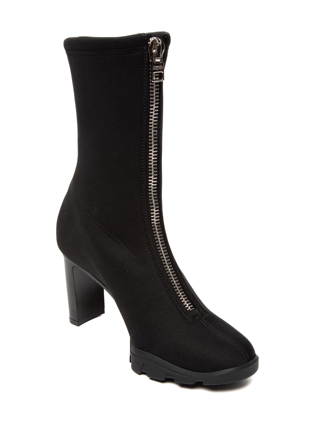 CONDITION is Never worn, with tag. No wear to Boots is evident. Minor defects near sole, and no dustbags included with this brand new Alexander McQueen designer resale item. Details Black Neoprene Rubber sole Round toe Zip up fastening Leather