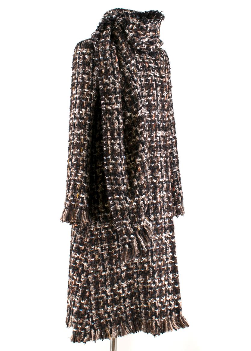 Alexander McQueen Wool Braided Long Coat 

-Brown, heavy weight, unknown wool blend
-Black, brown, pink braided fabric 
-Fringe detail on cuffs and hem
-Single double breast button fastening (near neckline) 
-Two centre hidden snap