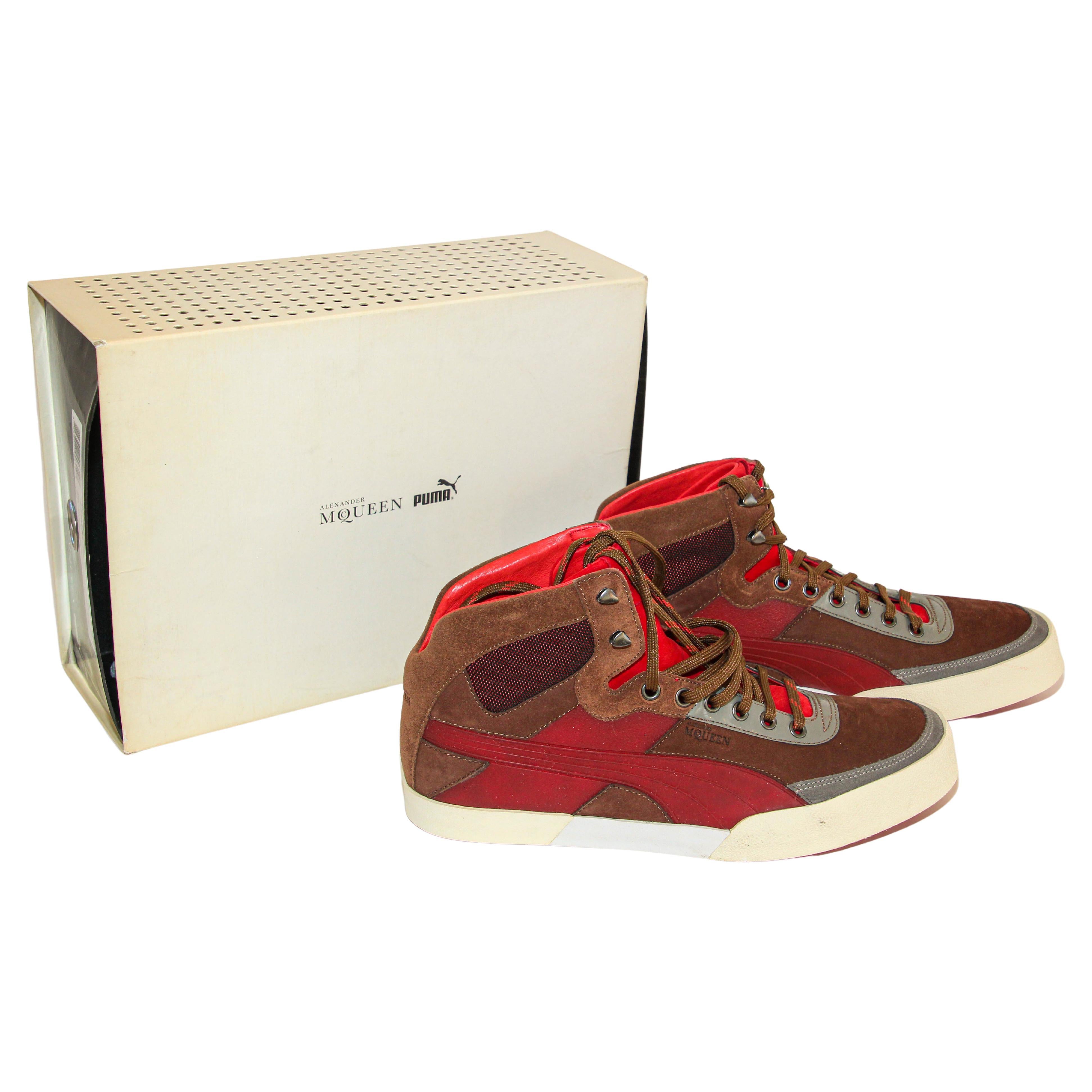 Alexander McQueen X Puma AMQ Trail Trainer Mid- Top Sneakers Brown and Red Suede.
Alexander McQueen Puma,  never worn, new in box.
Alexander McQueen X Puma Sneaker
Size Men's / US 9 / EU 42
PUMA Alexander McQueen fashion sneakers, suede and