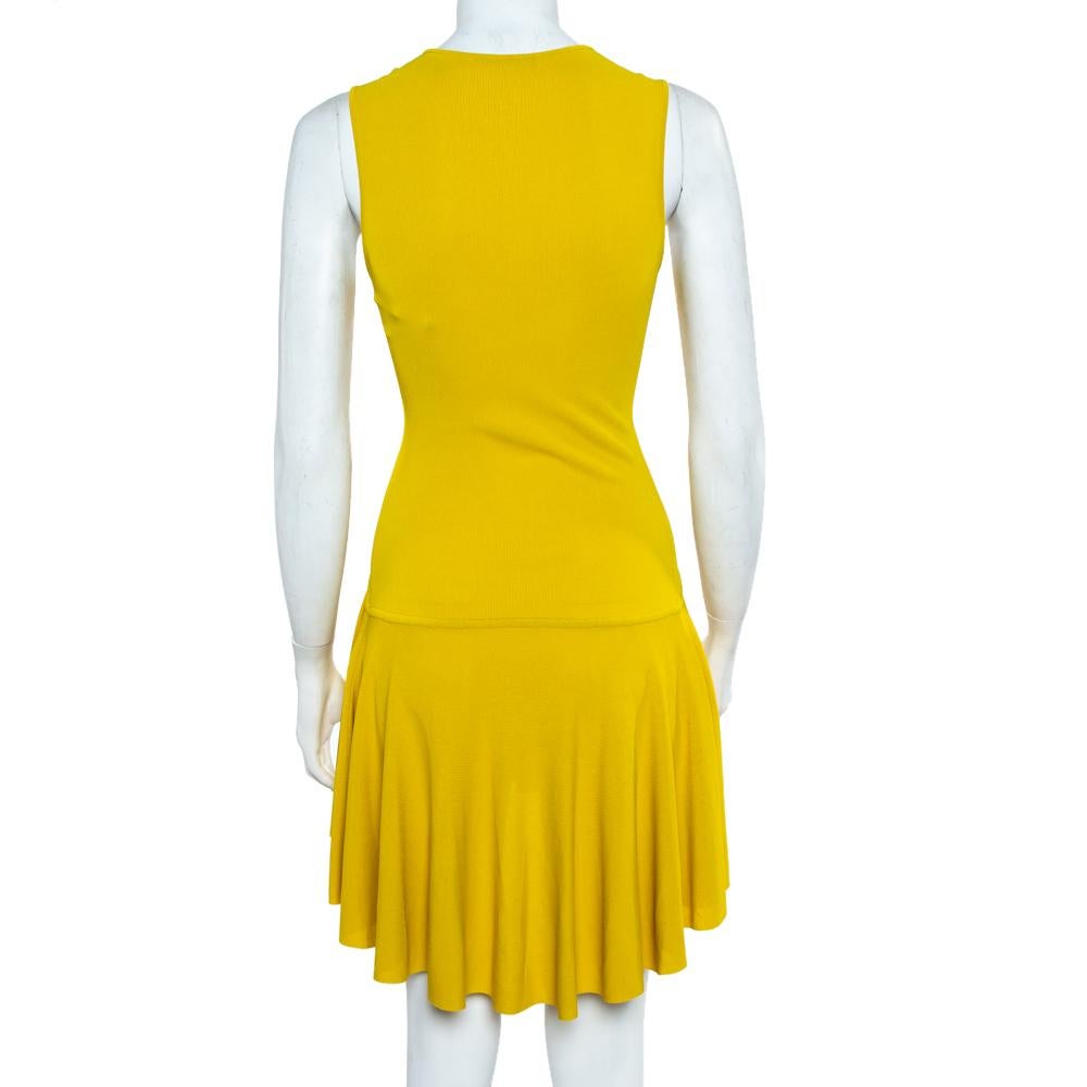 You just can't miss this Alexander McQueen creation, it is extraordinary. The skater dress fills in all your demands whether it's about style, comfort, or even just color. The sleeveless dress has a remarkable appeal and features a ruffled hem. With