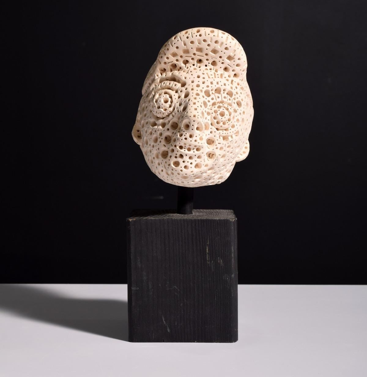 Additional Information: Provenance: Private Collection New York, from a collector of many petite works by the artist.

Marking(s); notes: signed

Country of origin; materials: unknown; white terracotta, wood (base)

Dimensions: 9.75″oah; sculpture: