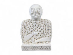 "Figura seduta in terracotta"