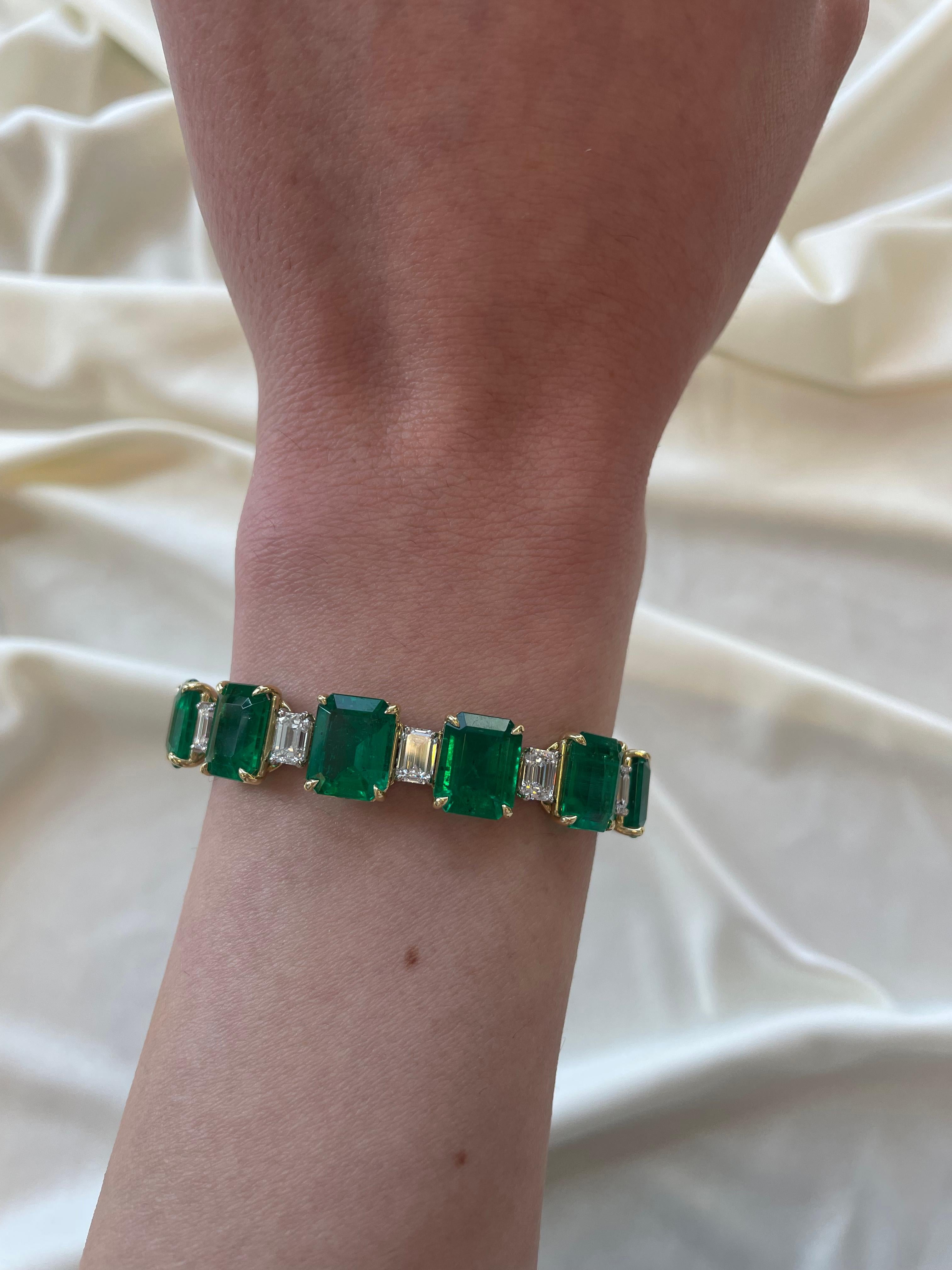 Exceptional and important modern emerald cut emerald and emerald cut diamond tennis bracelet, C. Dunaigre certified. High jewelry by Alexander Beverly Hills.
44.78 carat total diamond weight. 
15 square emerald cut emeralds, 37.03 carats. 15 emerald