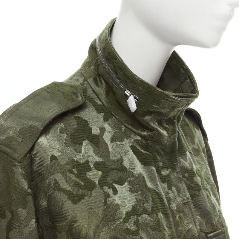 ALEXANDER WANG Army green camouflage jacquard military coat XS
Reference: MELK/A00005
Brand: Alexander Wang
Designer: Alexander Wang
Material: Wool, Polyamide
Color: Green
Pattern: Camouflage
Closure: Zip
Lining:  Cotton
Made in: