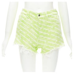 ALEXANDER WANG Bite High Rise, pantaloncini in denim verde con stampa logo, 24".