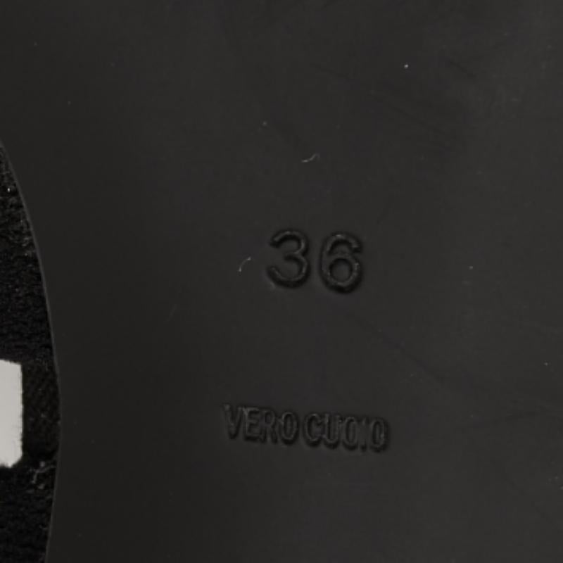 The ankle wrap of these Alexander Wang sandals will lend you the desired fit. Created from canvas, they are designed in a versatile black shade and are uplifted upon 10cm heels.