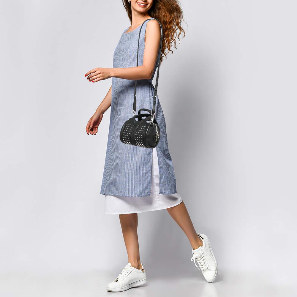 Functional and stylish this designer labels collections capture the effortless elegant finesse of the modern woman. Crafted from quality materials this chic bag is easy to carry and can fit in your daily essentials effortlessly.