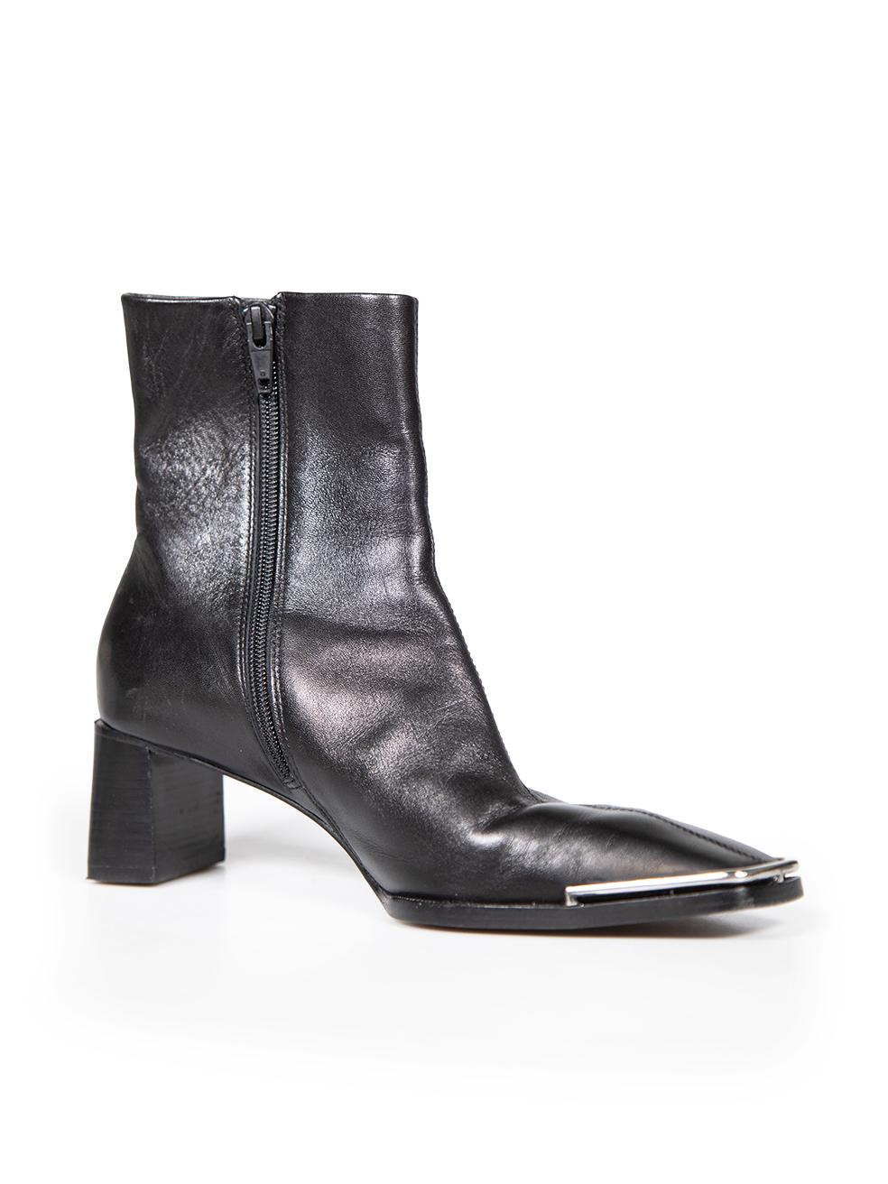 CONDITION is Very good. Minimal wear to boots is evident. Minimal scratches to the top area, sides and back of both shoes. Small tarnishing to the left hardware and abrasions to the tip of both shoes on this used Alexander Wang designer resale
