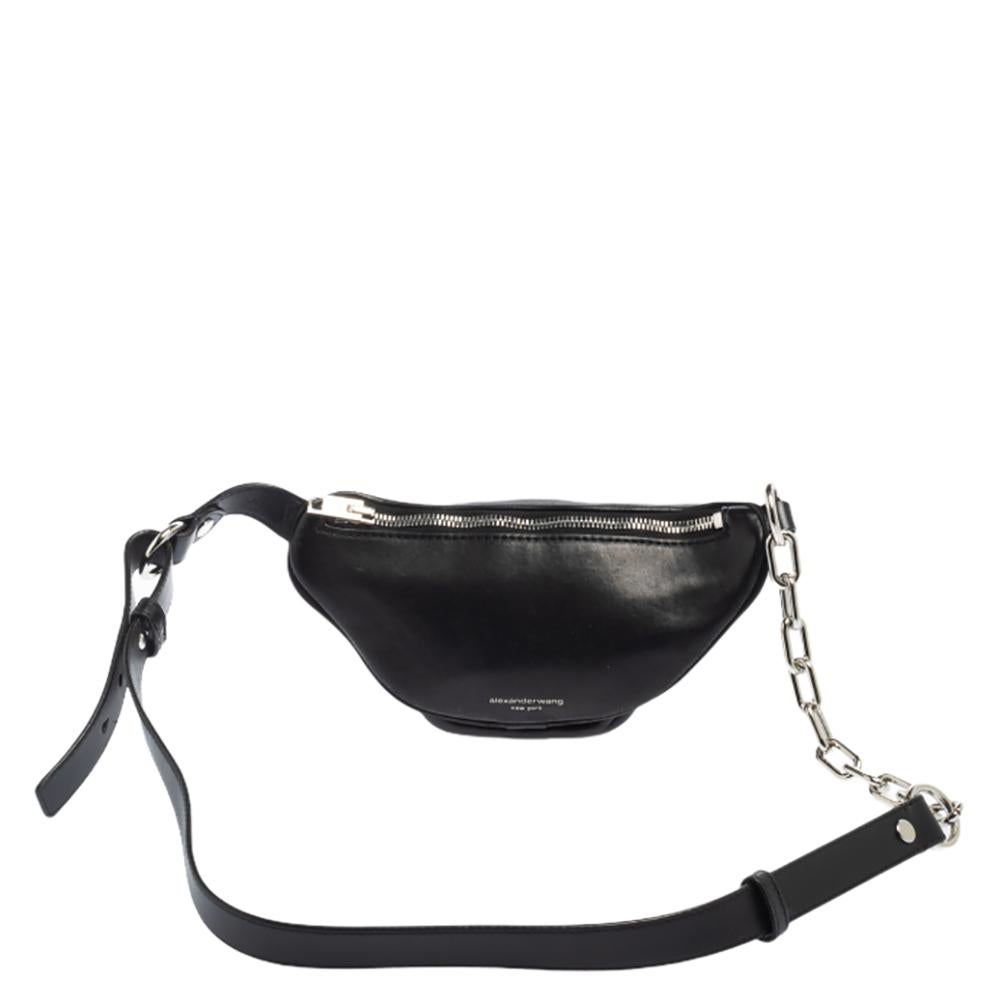 This belt bag from Alexander Wang is exquisite. It has been crafted using quality leather and comes in a classic shade of black. It is stylish and extremely well-made. It has multiple zip closures that lead to a fabric-lined interior for your