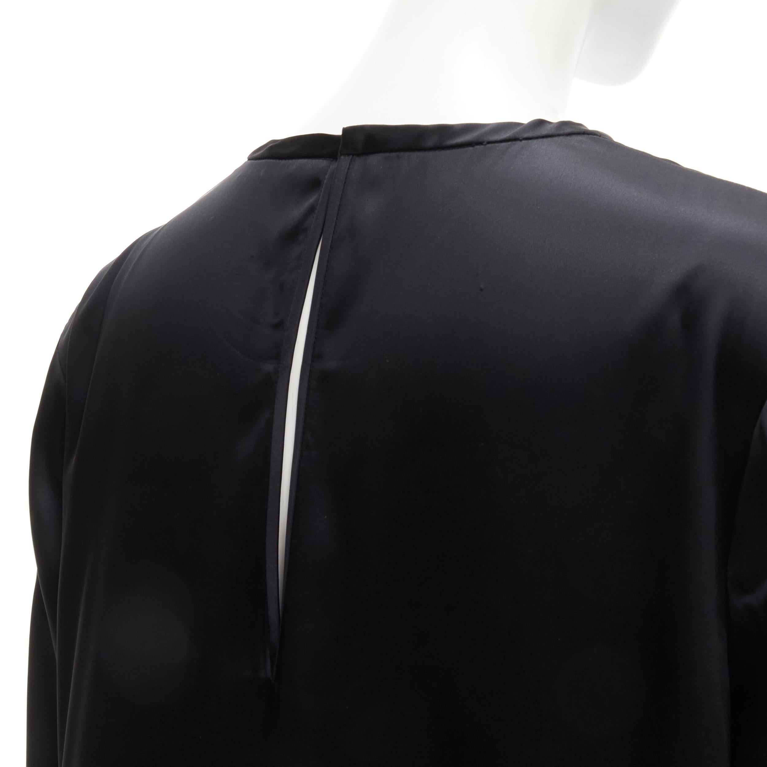 ALEXANDER WANG - Robe à col ras-du-cou classique et manches 3/4 en satin noir - US6 M
Référence : YNWG/A00133
Marque : Alexander Wang
Designer : Alexander Wang
MATERIAL : Acétate, mélange
Couleur : Noir
Motif : Solide
Fermeture : Bouton en forme de