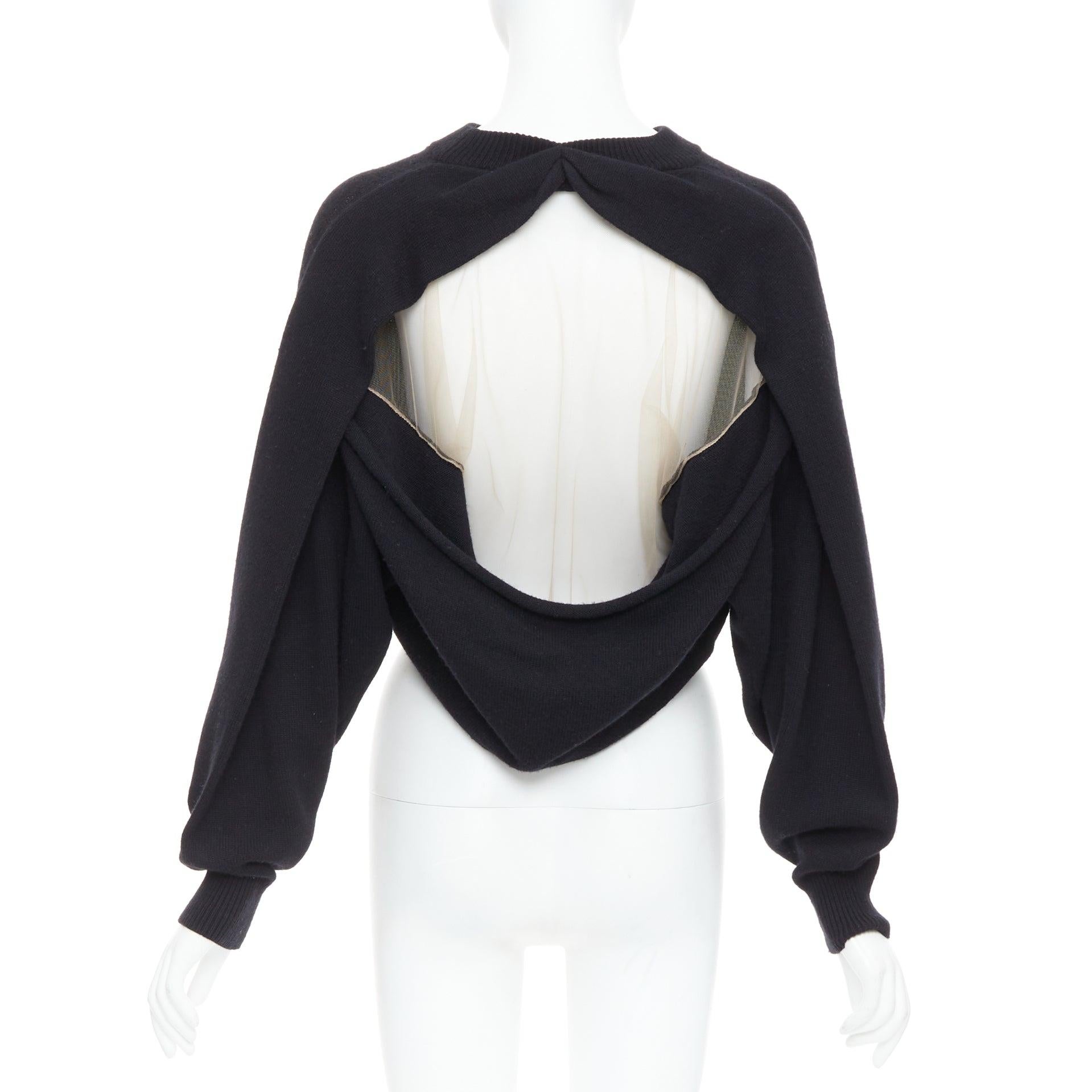 Alexander Wang maglione nero in misto lana con schiena trasparente S
Riferimento: GEGG/A00183
Marchio: Alexander Wang
Stilista: Alexander Wang
Materiale: Lana, misto
Colore: Nero, Nudo
Modello: Tinta unita
Chiusura: Pullover
Dettagli extra: Schiena