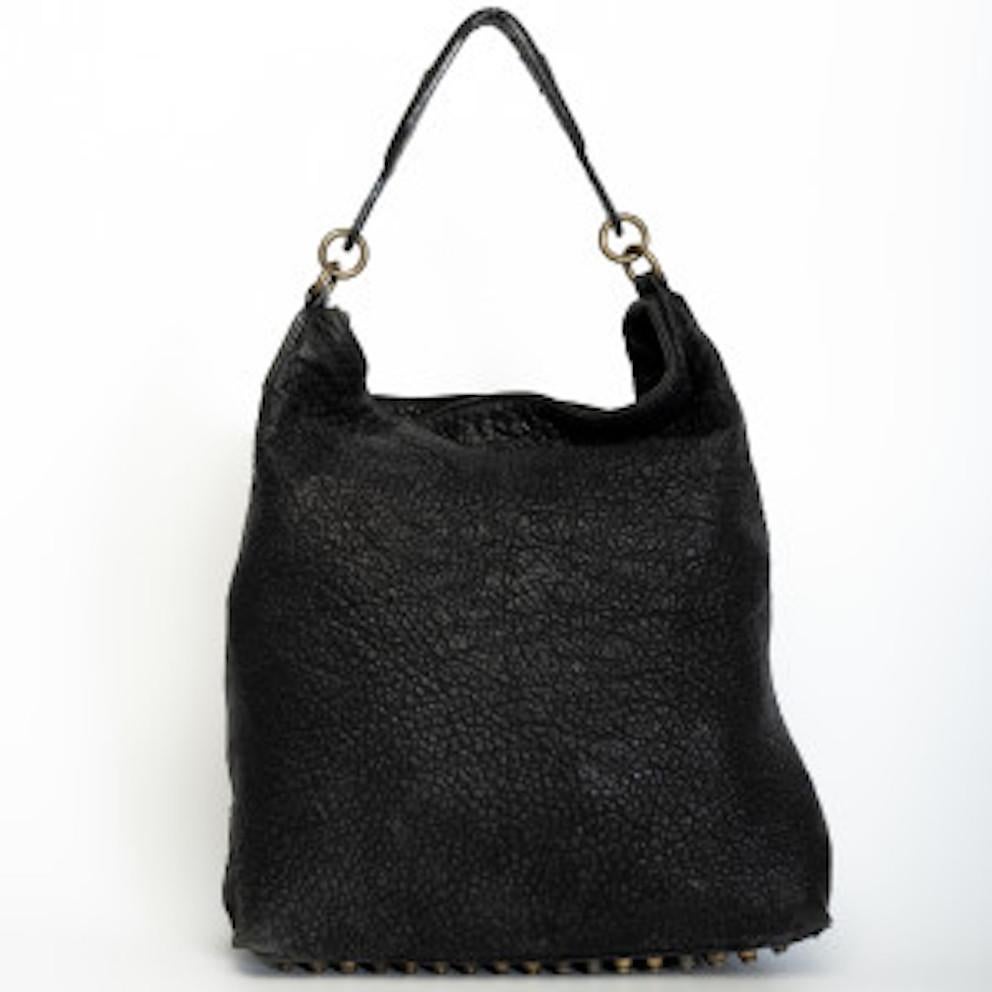 Black leather Hobo bag from Alexander Wang, with the signature bottom full of brass studs.

COLOR: Black
MATERIAL: Leather
MEASURES: H 16” x L 16” x D 4”
CONDITION: Fair - the exterior of the bag shows signs of wear and tear such as scuffing at the