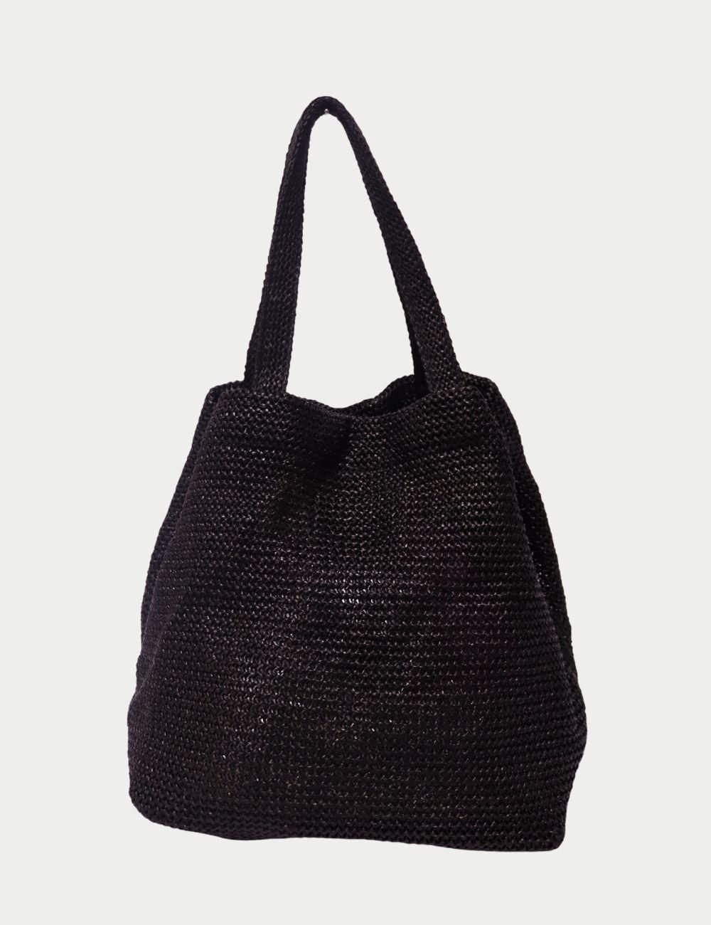 Borsa Hobo a maglia di Alexander Wang - Tote con logo nero

L'eleganza e la sportività si incontrano nella borsa Hobo in maglia di Alexander Wang, un oggetto essenziale e cool realizzato in maglia flessibile nera con una sottile lucentezza. Questa