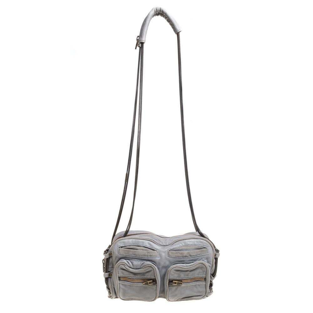 Impeccable craftsmanship meets practicality in this Brenda bag by Alexander Wang. Crafted from grey-shaded leather, it comes equipped with multiple pockets on the exterior, and the zipper fastening secures a well-sized interior lined with fabric.